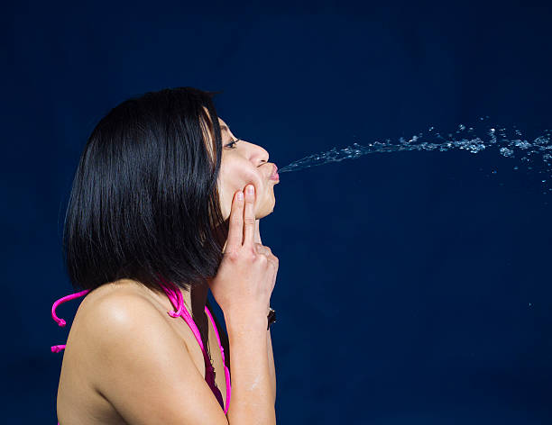 Meaning of Dreaming About Spitting Something Out